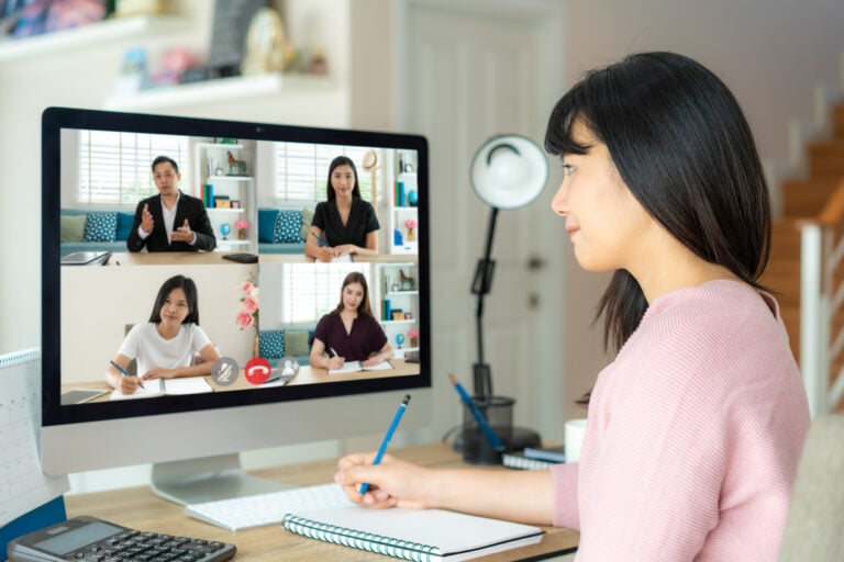 asian business woman talking to her colleagues about plan in vid